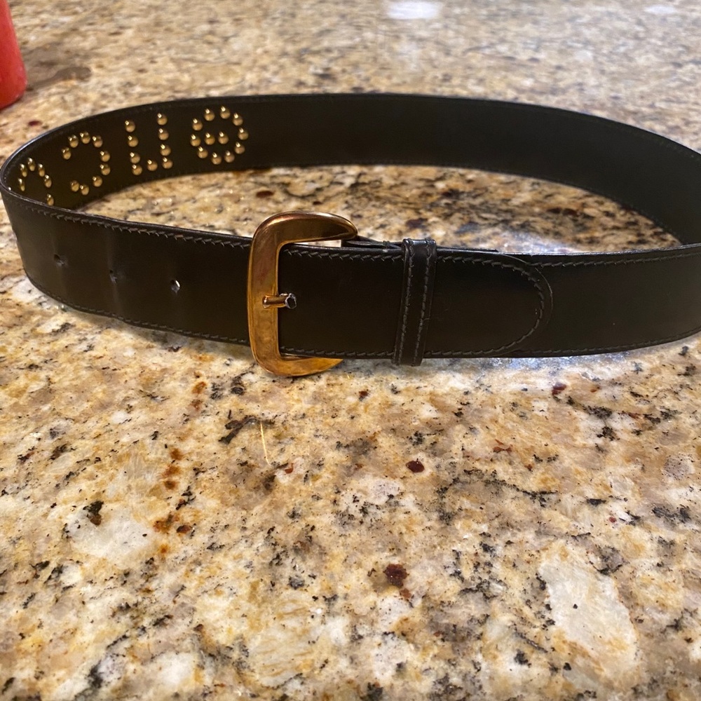 Gucci belt with studded Gucci logo